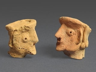 2 Ancient figurines of people found at Tel Motza